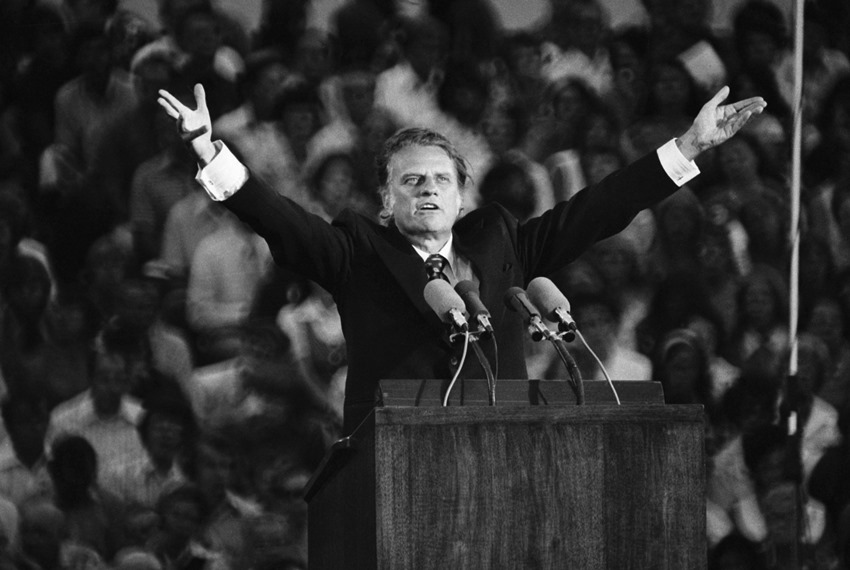 (Original Caption) 7/13/1973- St. Paul, MN: Evangelist Billy Graham preached the gospel 7/13 at the Upper Midwest Crusade in the opening of what he said may be one of his "latter stadium crusades." Graham likened each person's judgement day to the Watergate hearing. "Have you noticed how the TV cameras zoom in when the witness is asked difficult questions?" Graham asked his audience of 21,000. There is a judgement day, he told his audience, that no one can escape. BPA2# 4126.